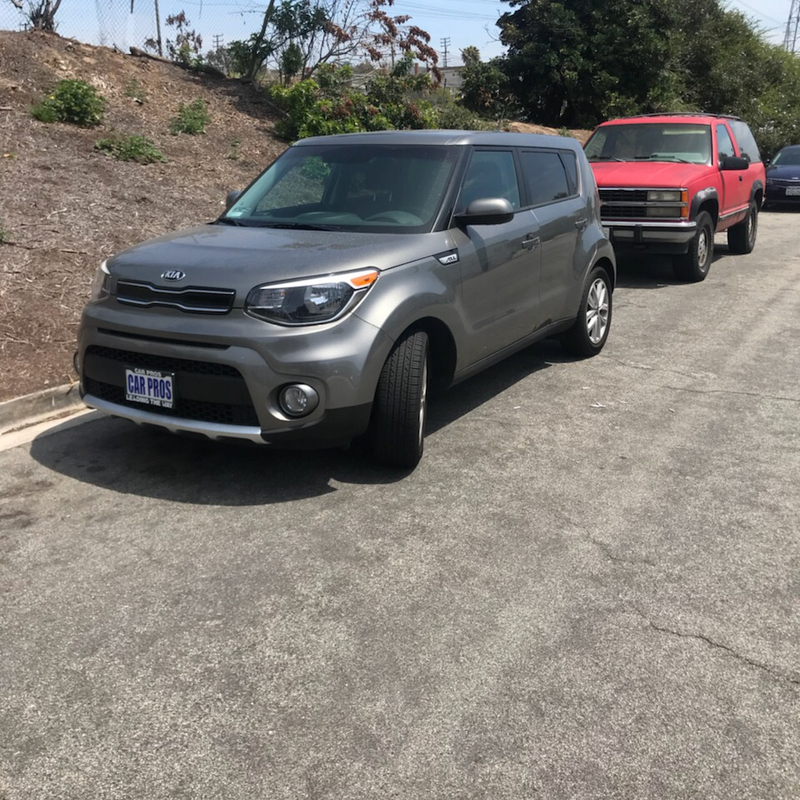 The KIA in question. Note the Cig butts on the ground